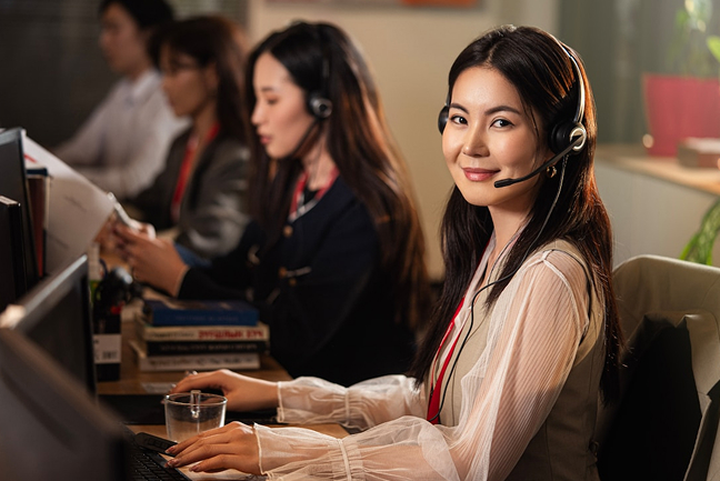 Woman with headset ready to help